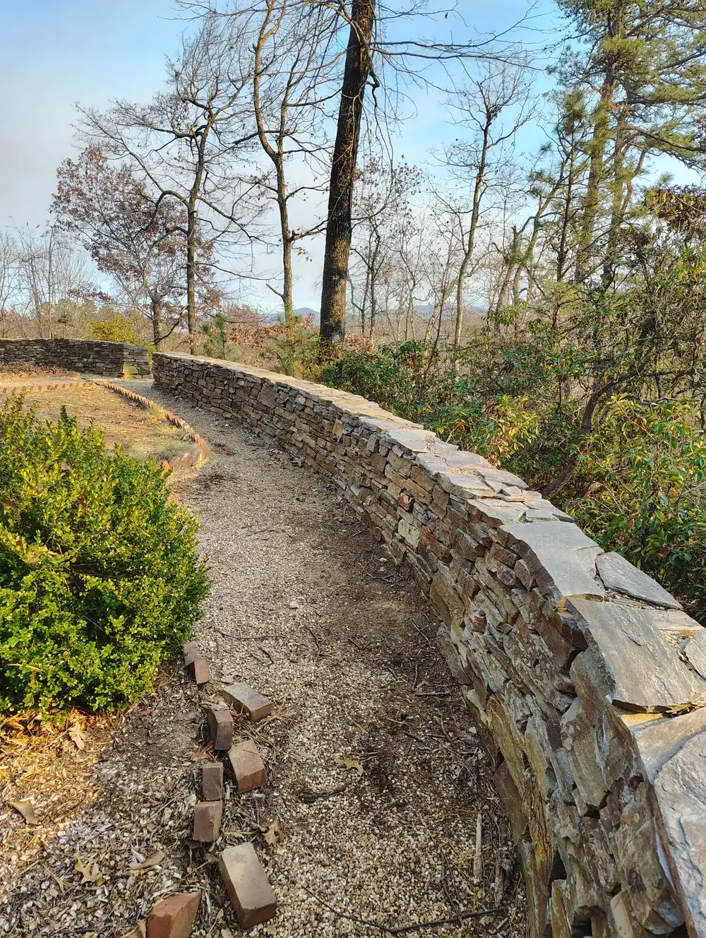 Dry-stack stone retaining wall with a mountain view in Asheville NC